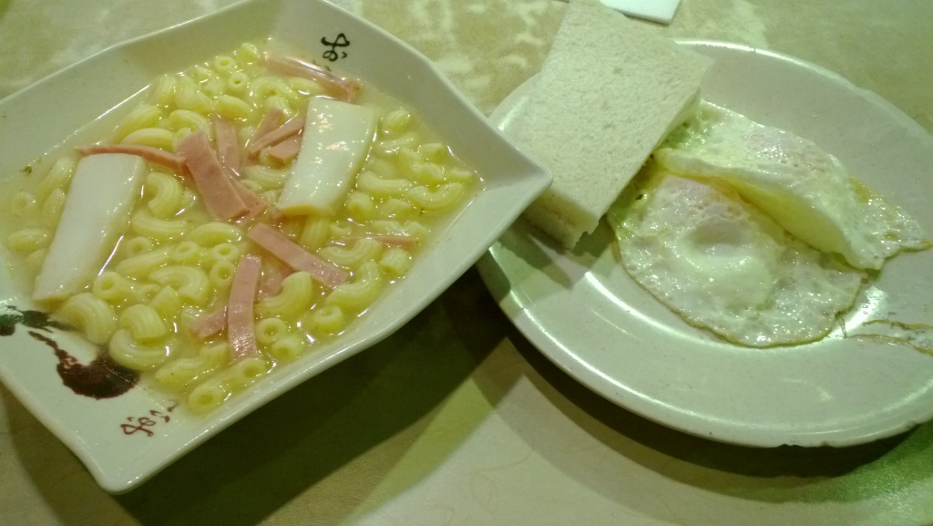 Macaroni with ham and abalone slice bread with butter and fried egg