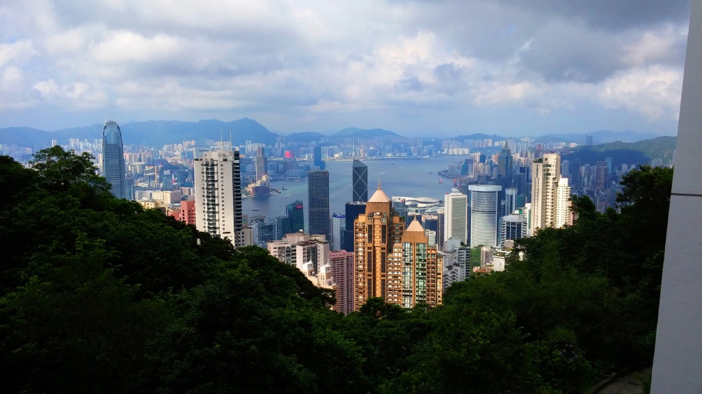Big contrast between the wooded Victoria Peak and compact Central financial area