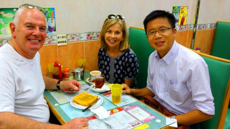 Frank the tour guide with guests at local restaurant