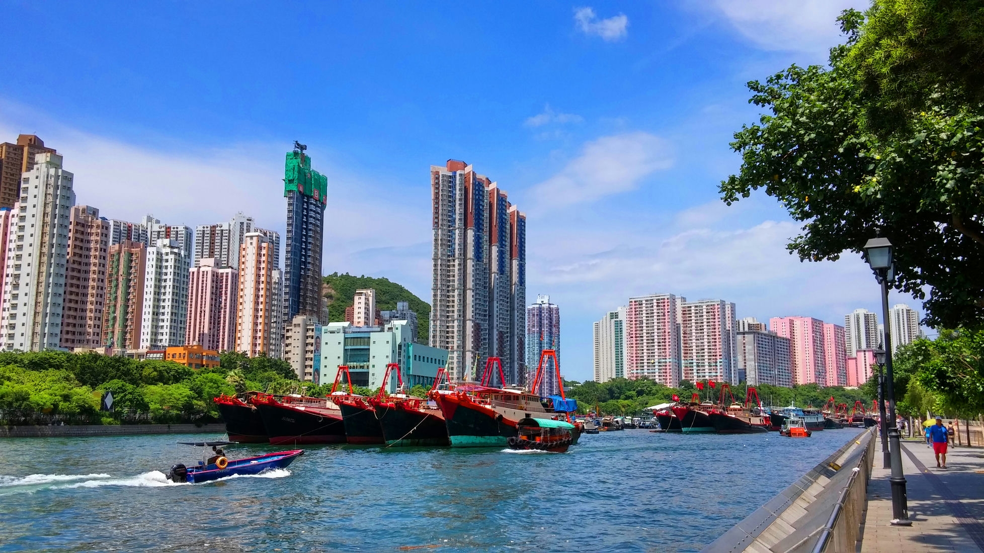 Aberdeen fishing village Ap Lei Chau Island fishing boats sunny day