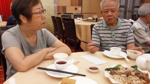 lady man inredtaurant with utensils food tea