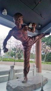 Bruce Lee kicking statue Hong Kong Heritage Museum