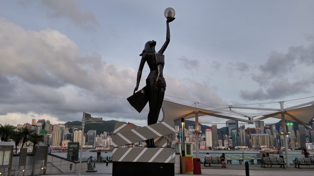 Hong Kong Film Award Statue at Garden of Stars Victoria Harbour sea view backdrop