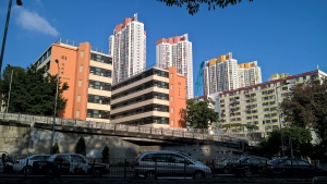 Mei Ho House (the short and orange building on the left) is right next to other public housing buildings.