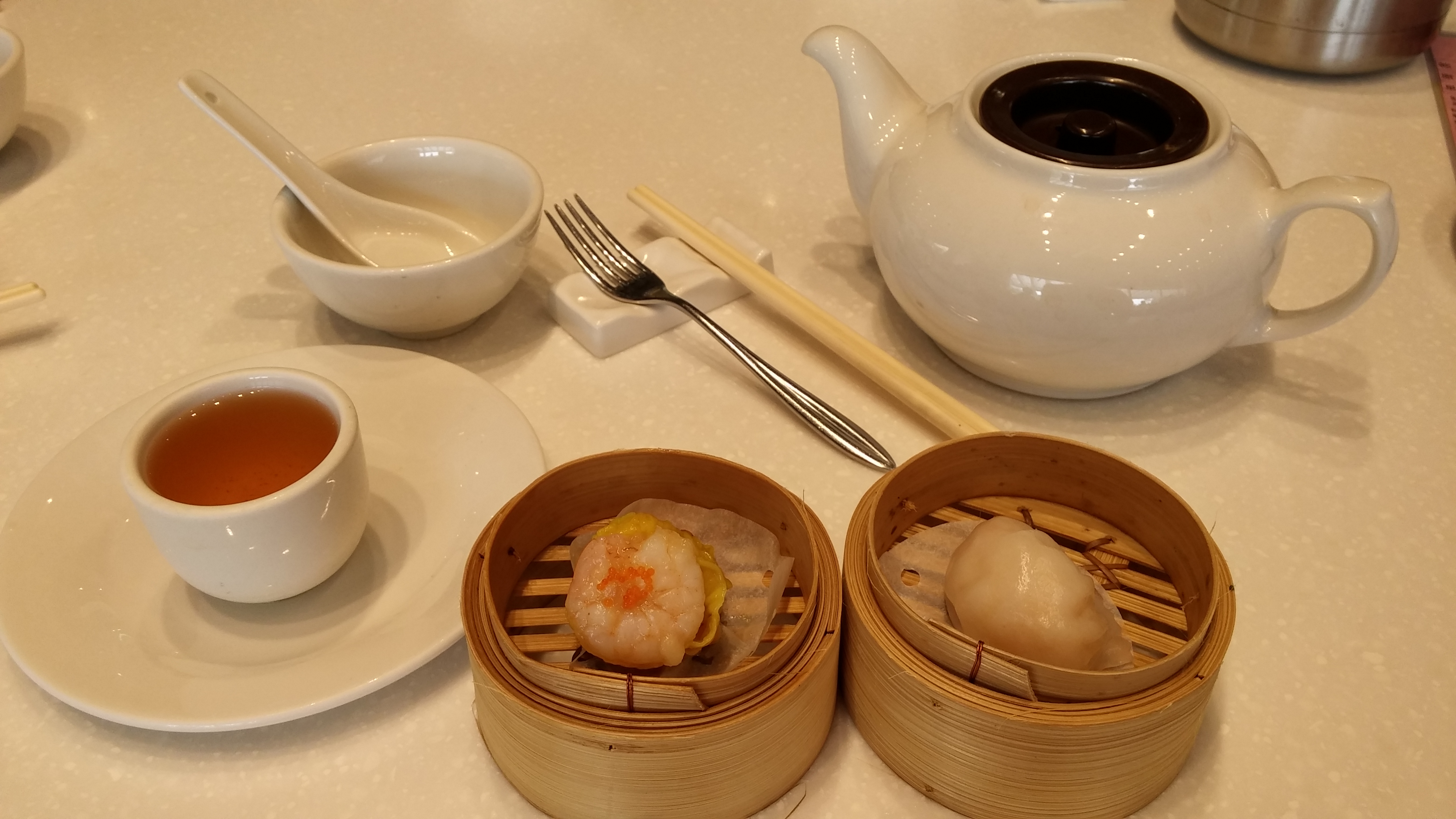 Shrimp dumpling and pork dumpling with tea