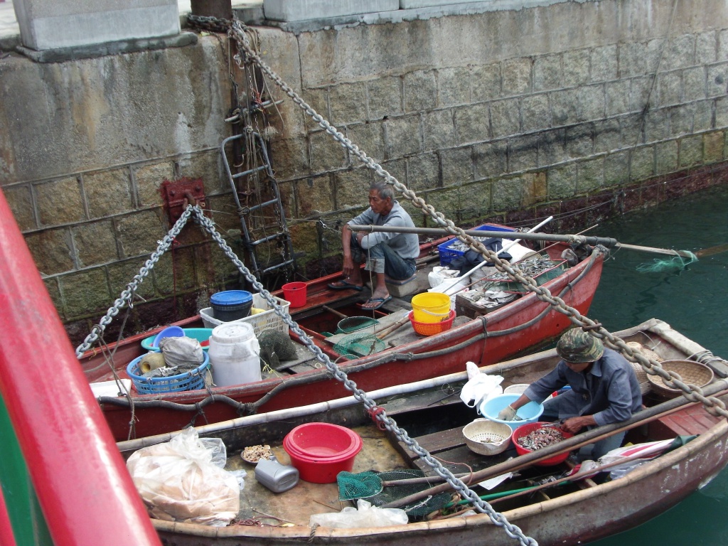 Fishermen at Aberdeen Fishing Village