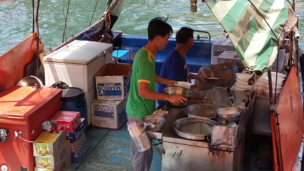 Sampan canteen chefs are making noodle for the customers