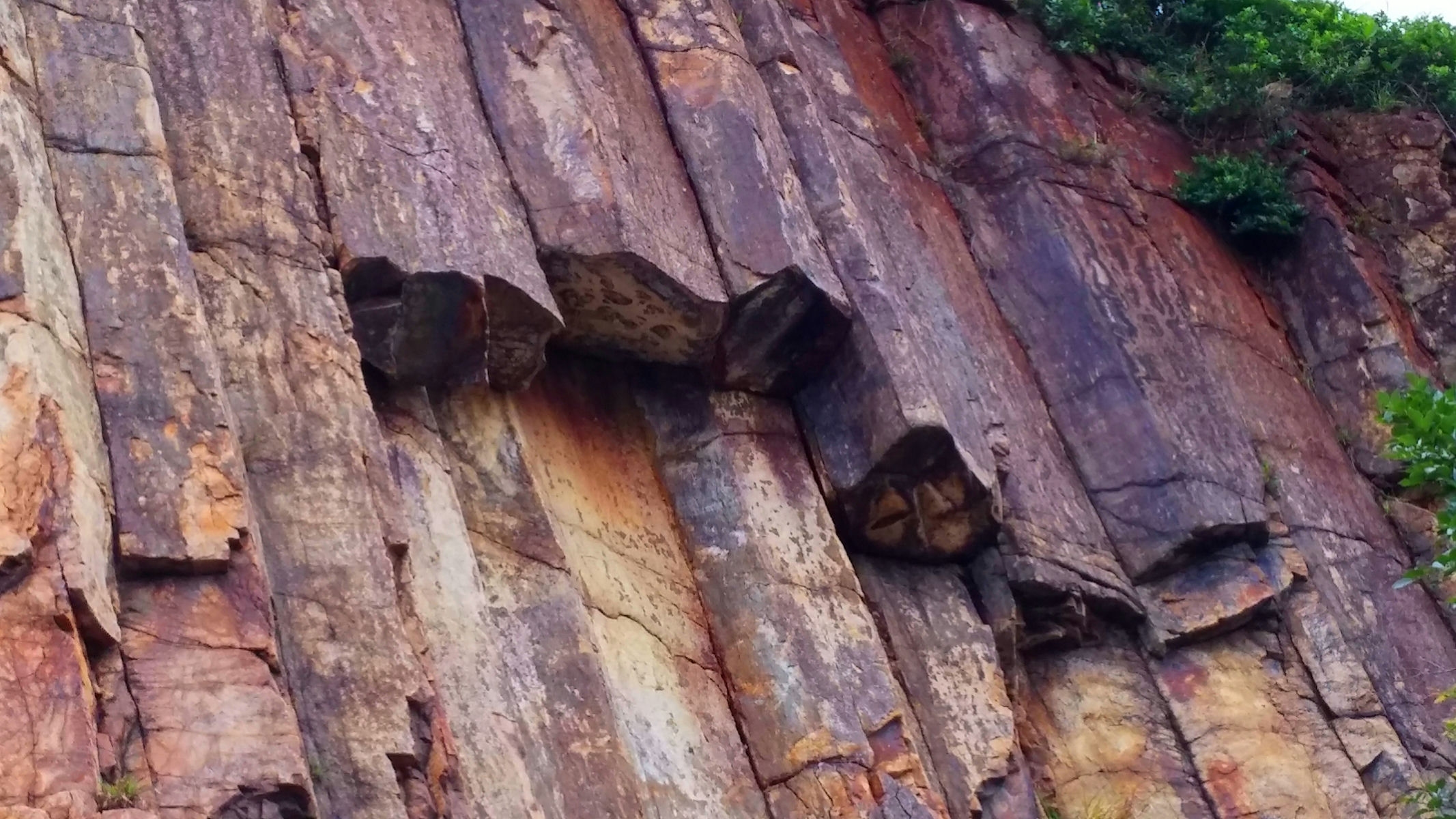 The broken hexagonal rock column at East Dam of High Island Reservoir