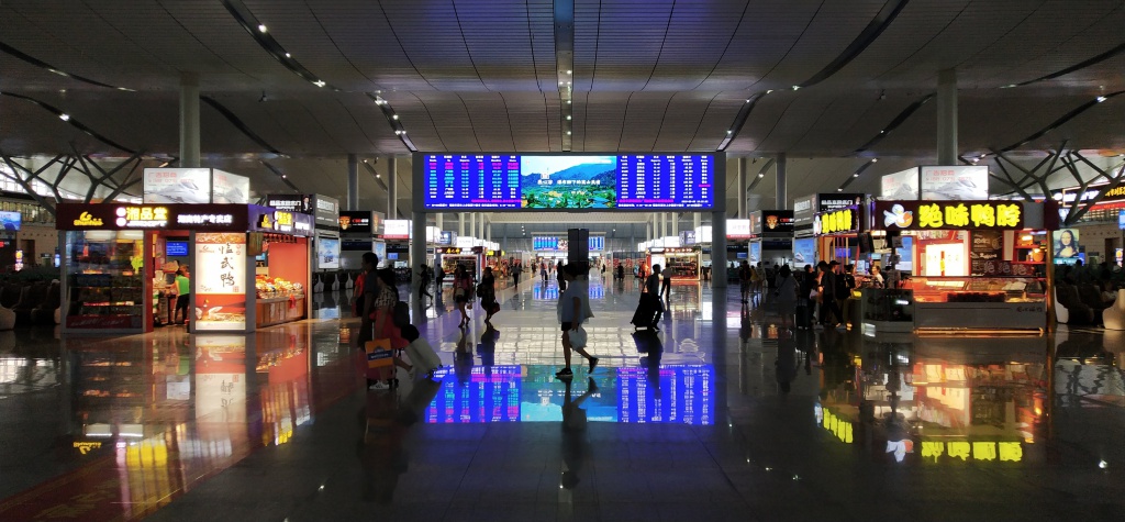 train station, passengers, screen shops