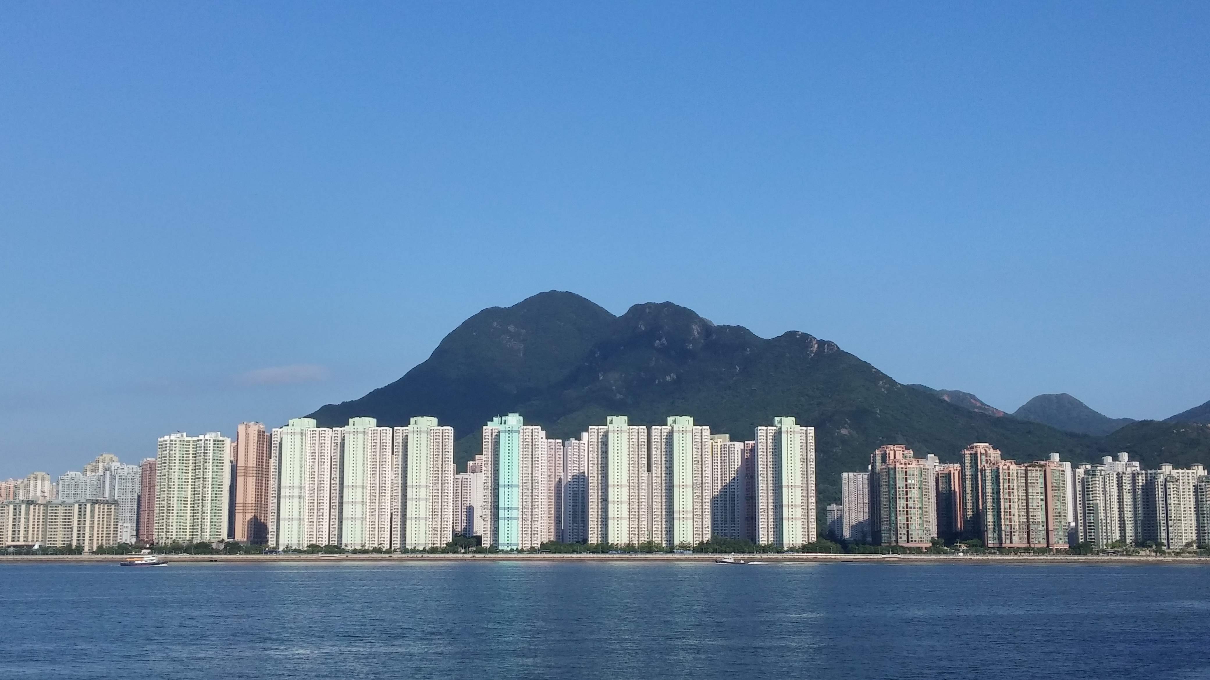 blue sky, tall buildings, see