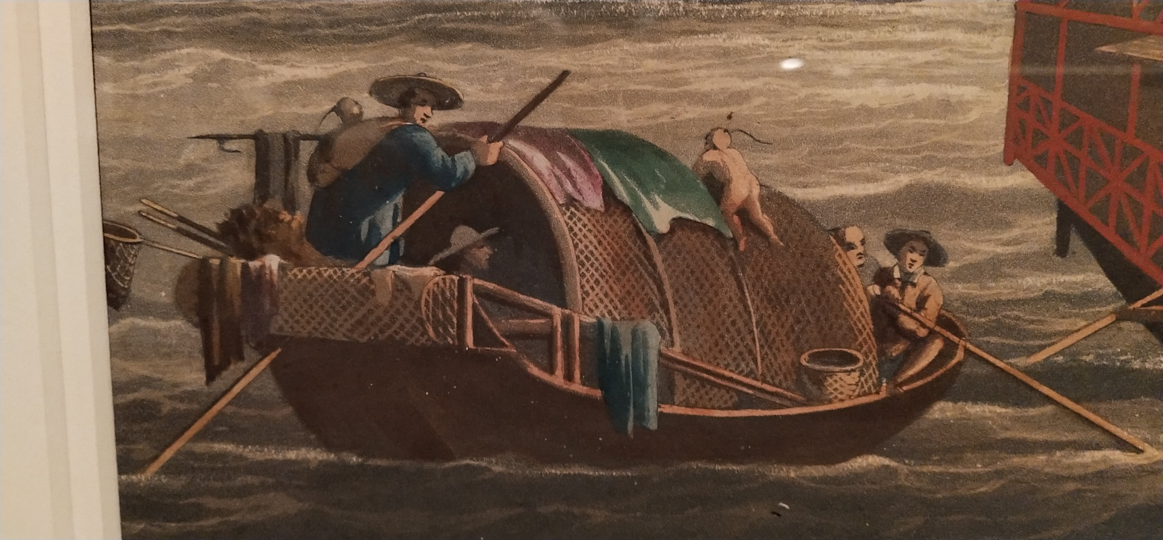 sampan boat, woman with baby on back controlling the boat, toddler falling to the sea