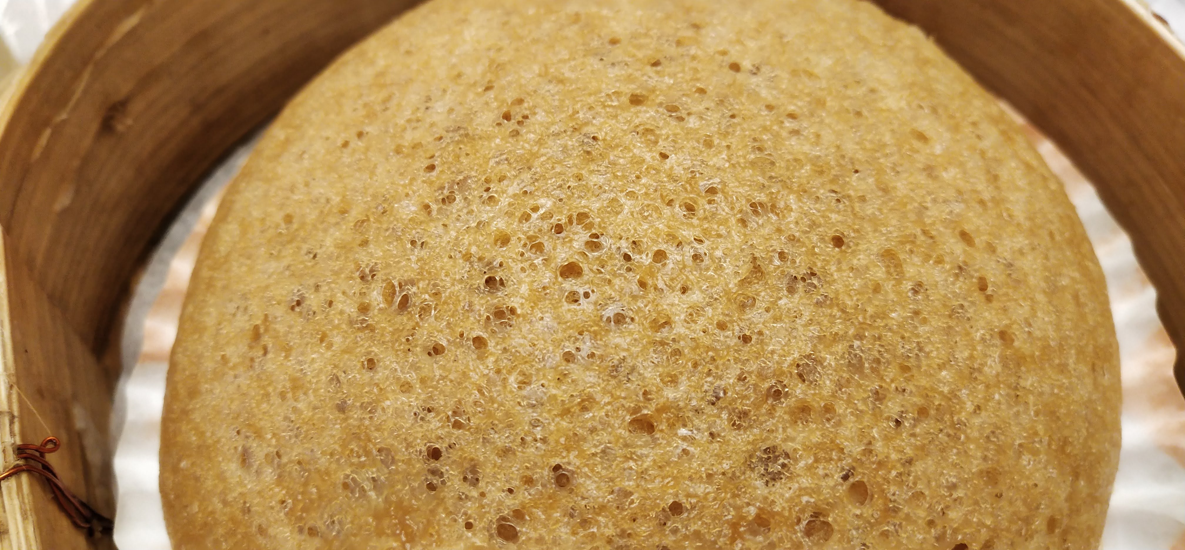 brown cake in bamboo container