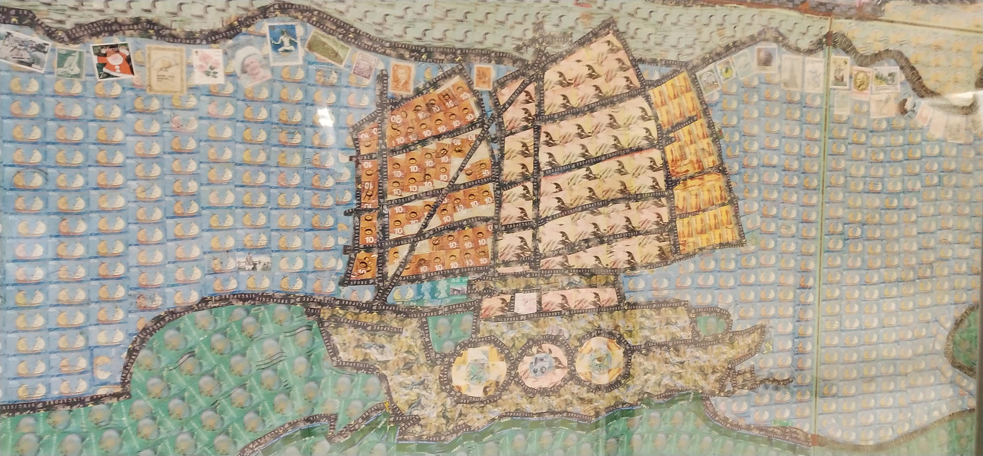 Junk boat with big sail in the mosaic by stamp