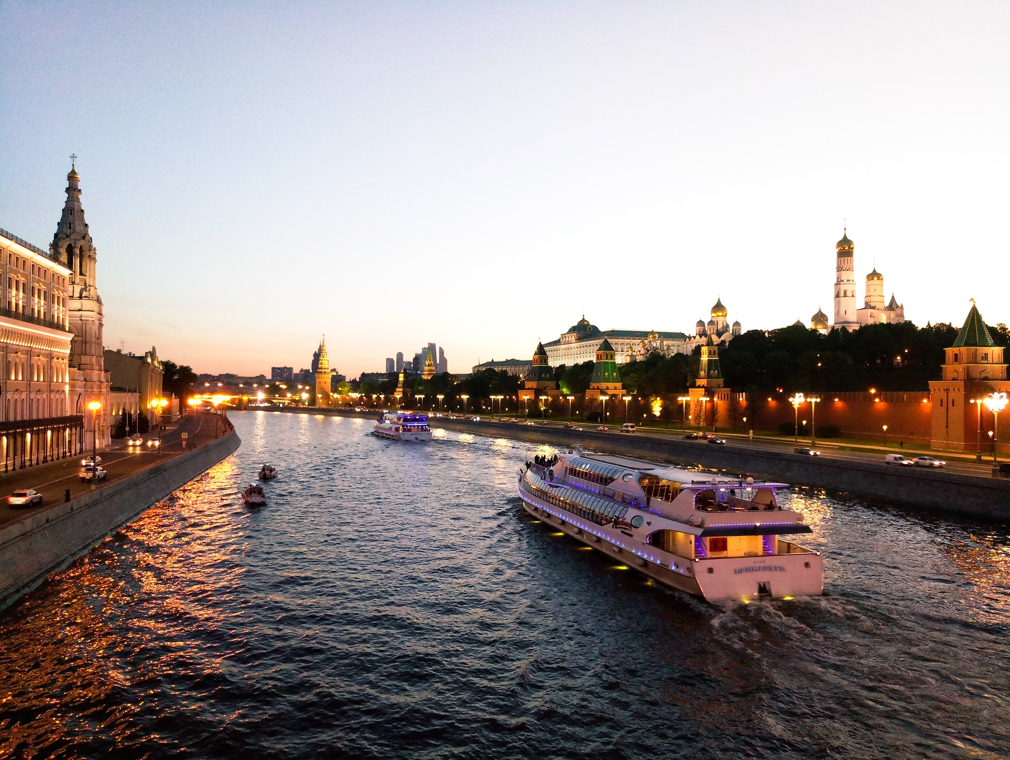 Small river cruise, sunset, heritage buildings