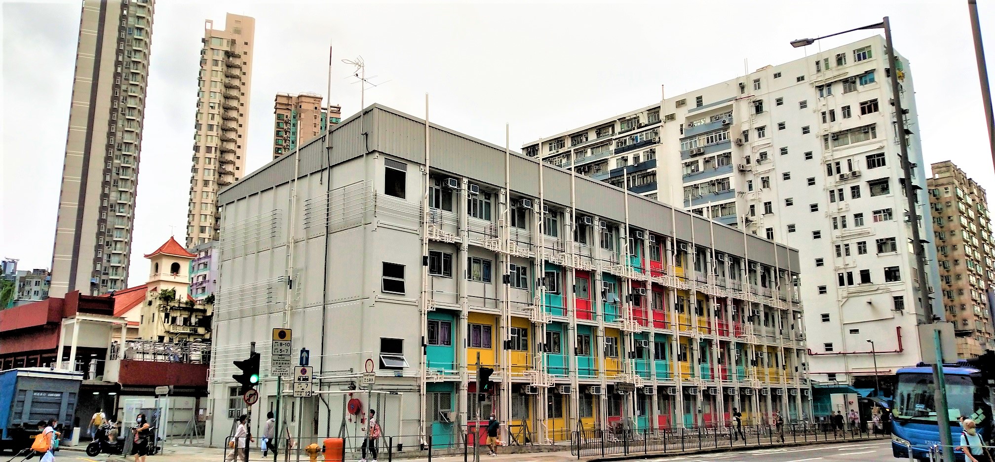 Transitional housing for the poor is near other old and new private residential buildings