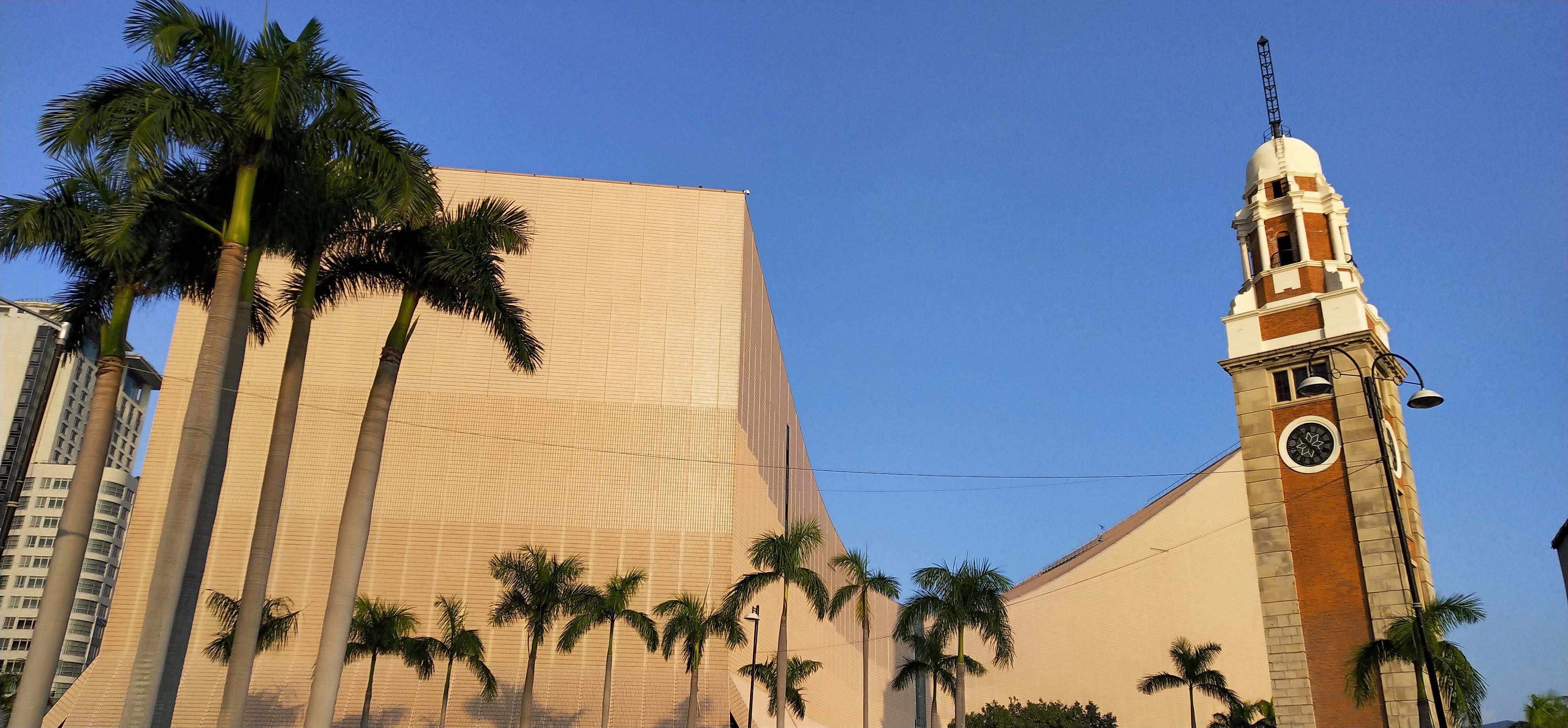 Cultural Center and Clock Tower under the cloudless blue sky in the fall