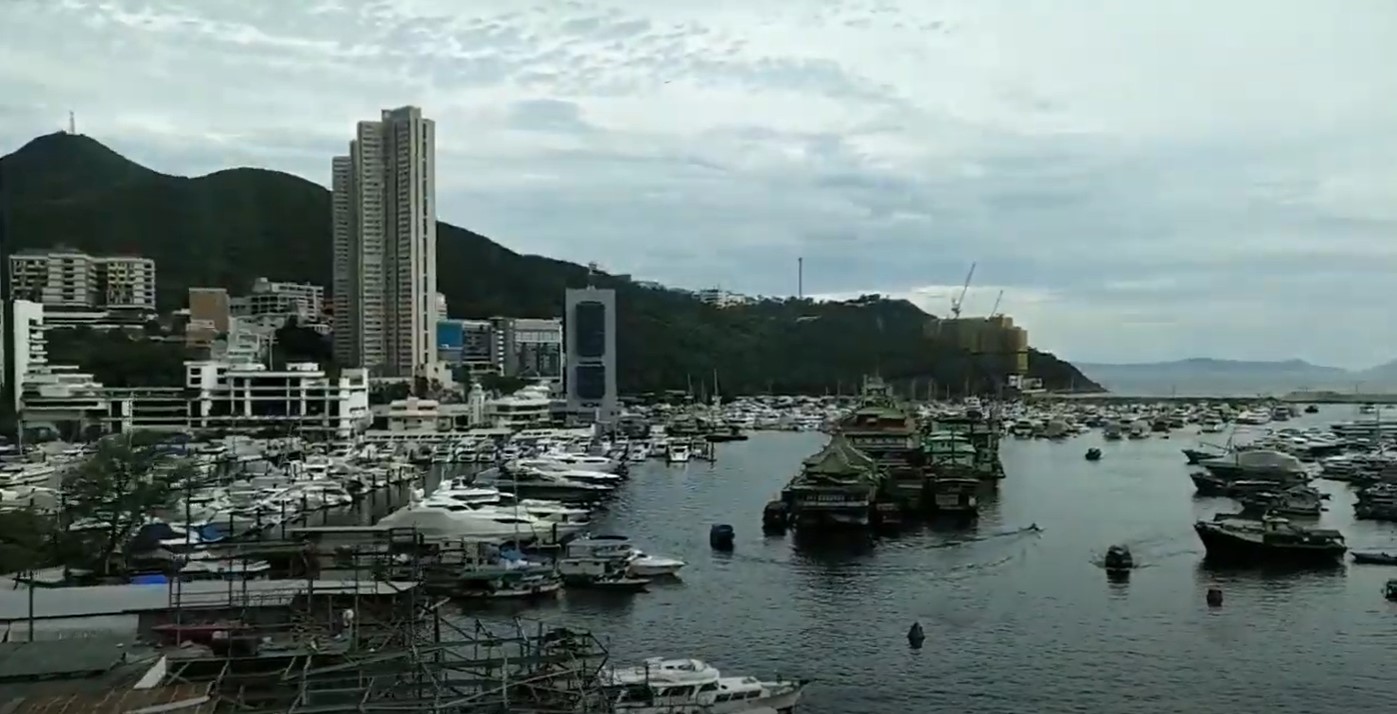 View for Aberdeen Channel and Jumbo Floating Restaurant from South Island Line metro train