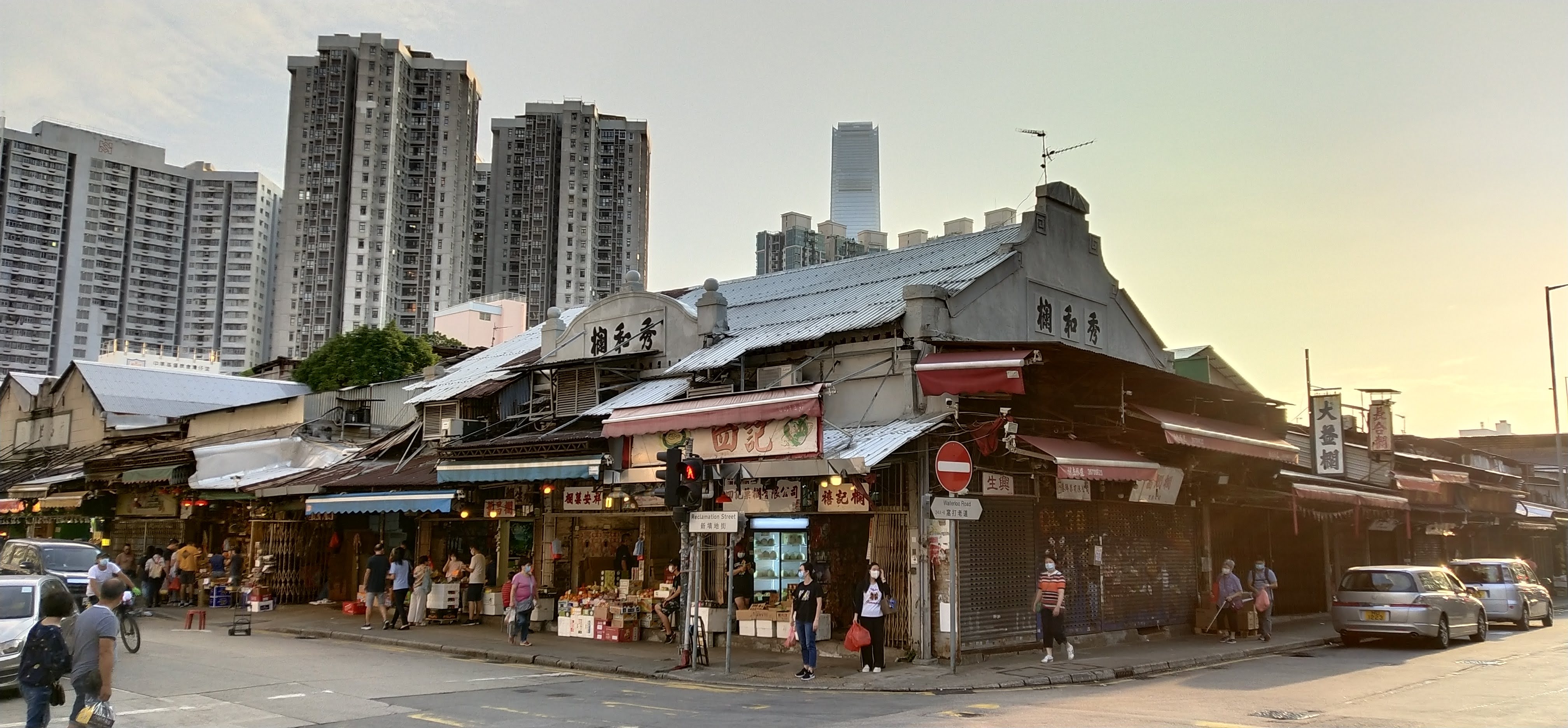 Yau Ma Tei Wholesale Fruit Market, the backdrop is the tallest ICC building