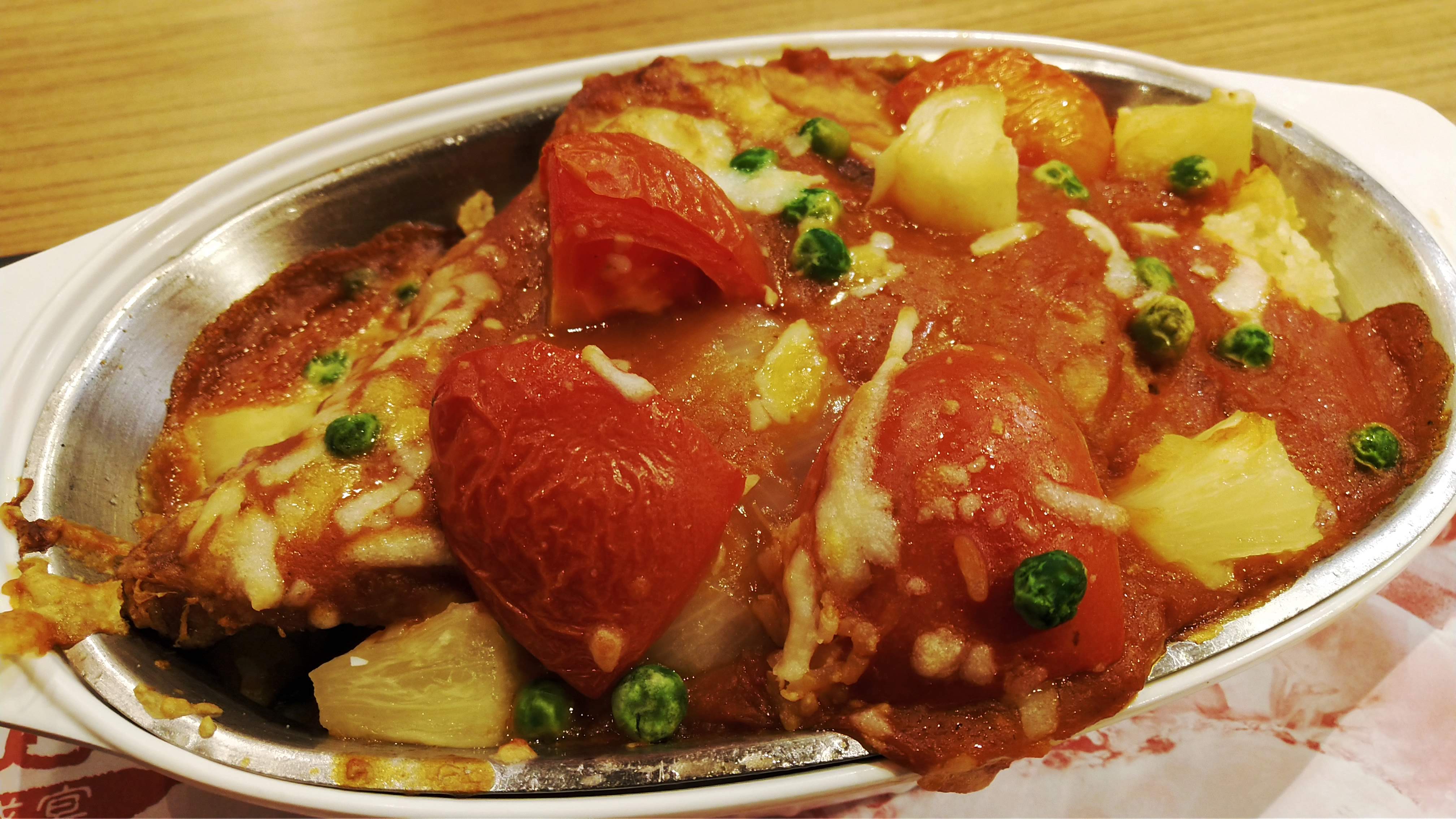 Baked pork chop rice with tomato and cheese