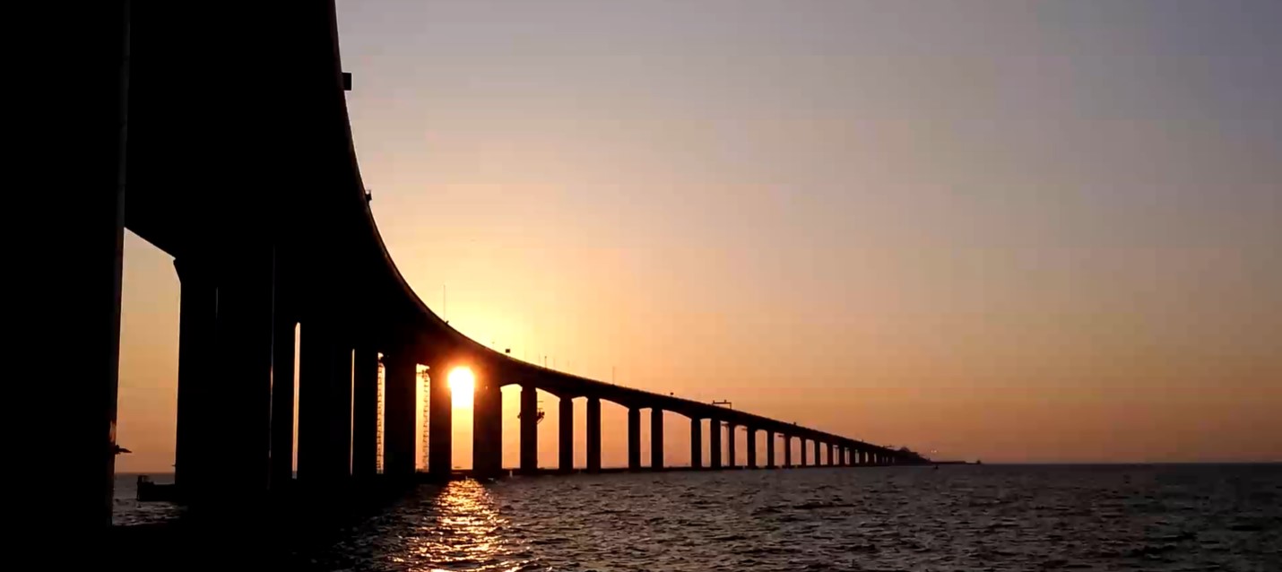 See sunset and Hong Kong Zhuhai Macau Bridge from the ferry