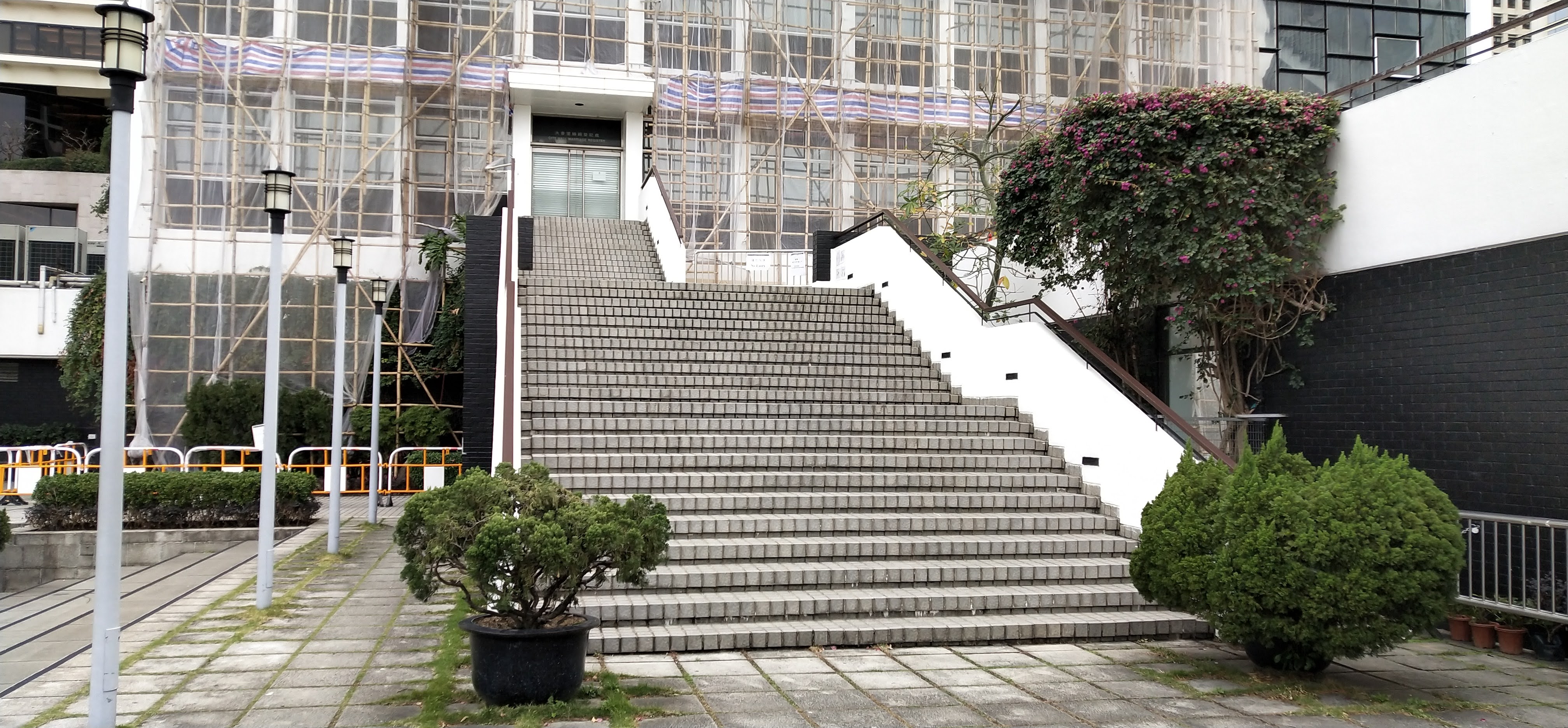 A lot of couples take photos at the steps with guests after the wedding ceremonies