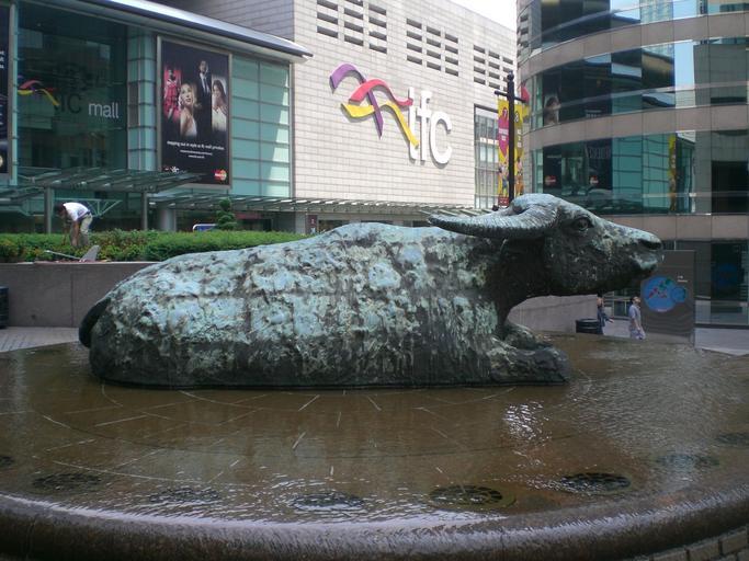 Lying buffalo sculpture