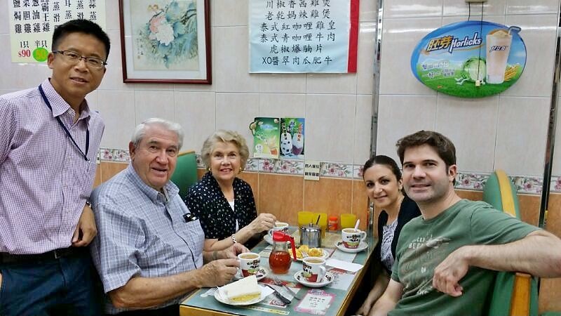 The son living in Hong Kong found Frank the tour guide to serve his parents in Hong Kong. Photo taken in local tea cafe during the private car tour.