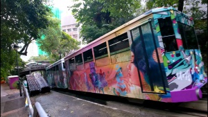 Old Peak Tram cars with new look.