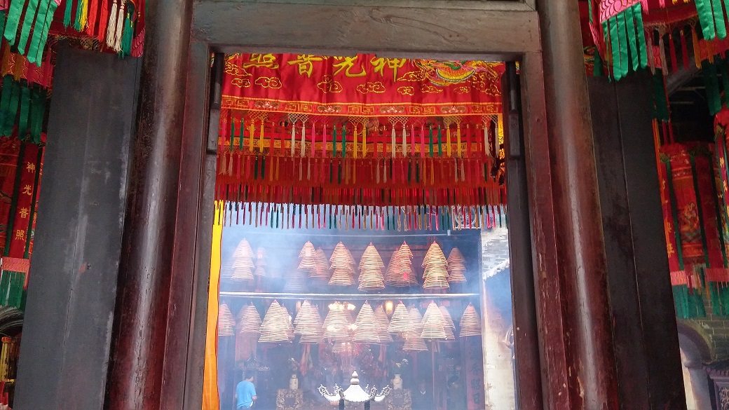 Incense coils make Tai Po Man Mo Temple smoky.