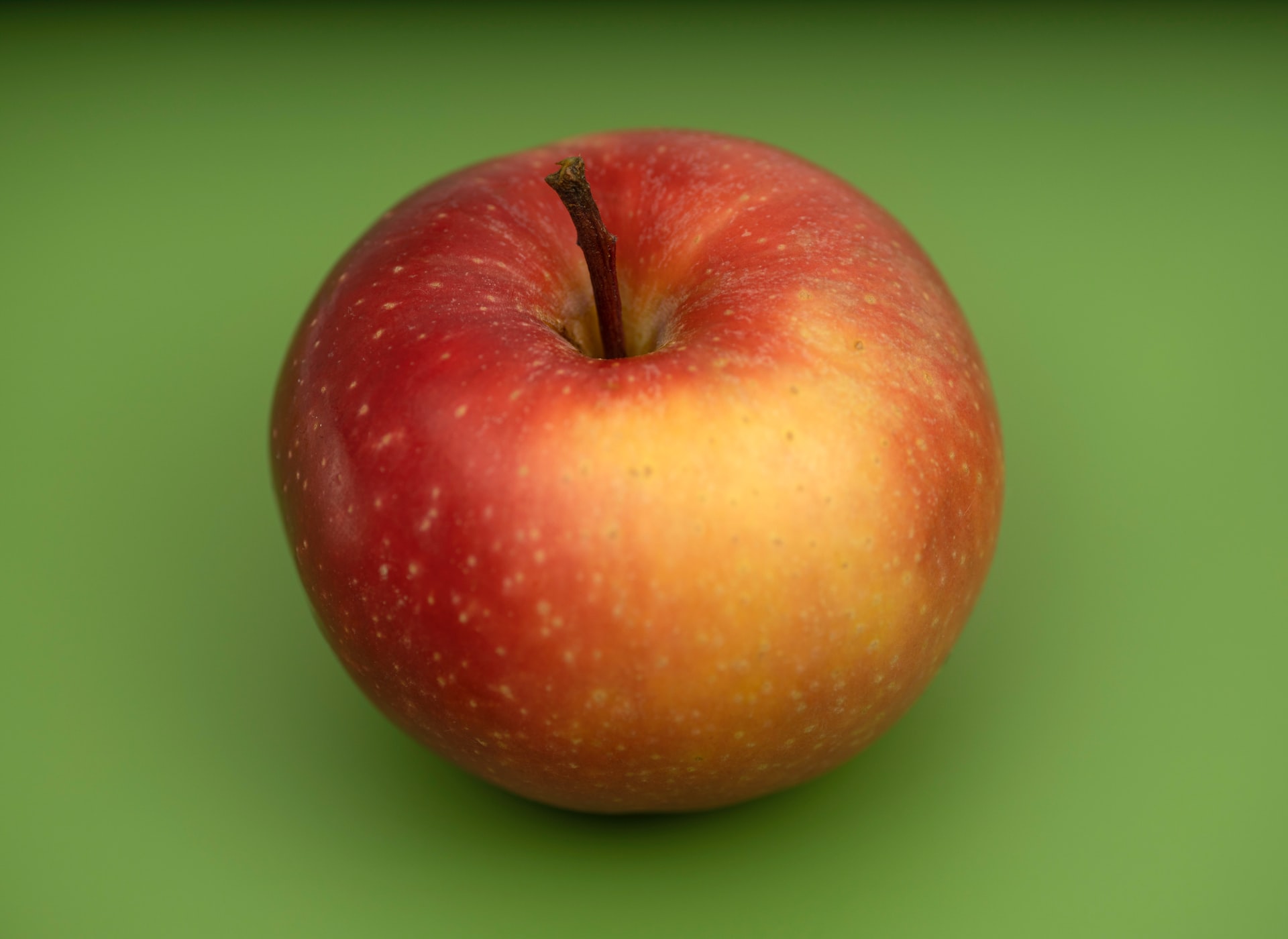 Apple, green background