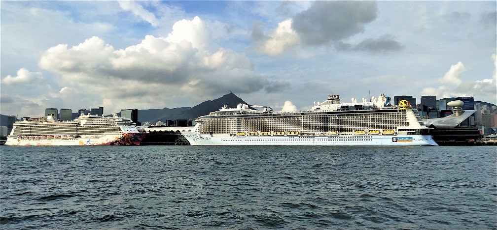 The giant Genting Dream and Spectrum of the Seas are berthing at the Kai Tak Cruise Terminal for Hong Kong citizens' seacation holidays.