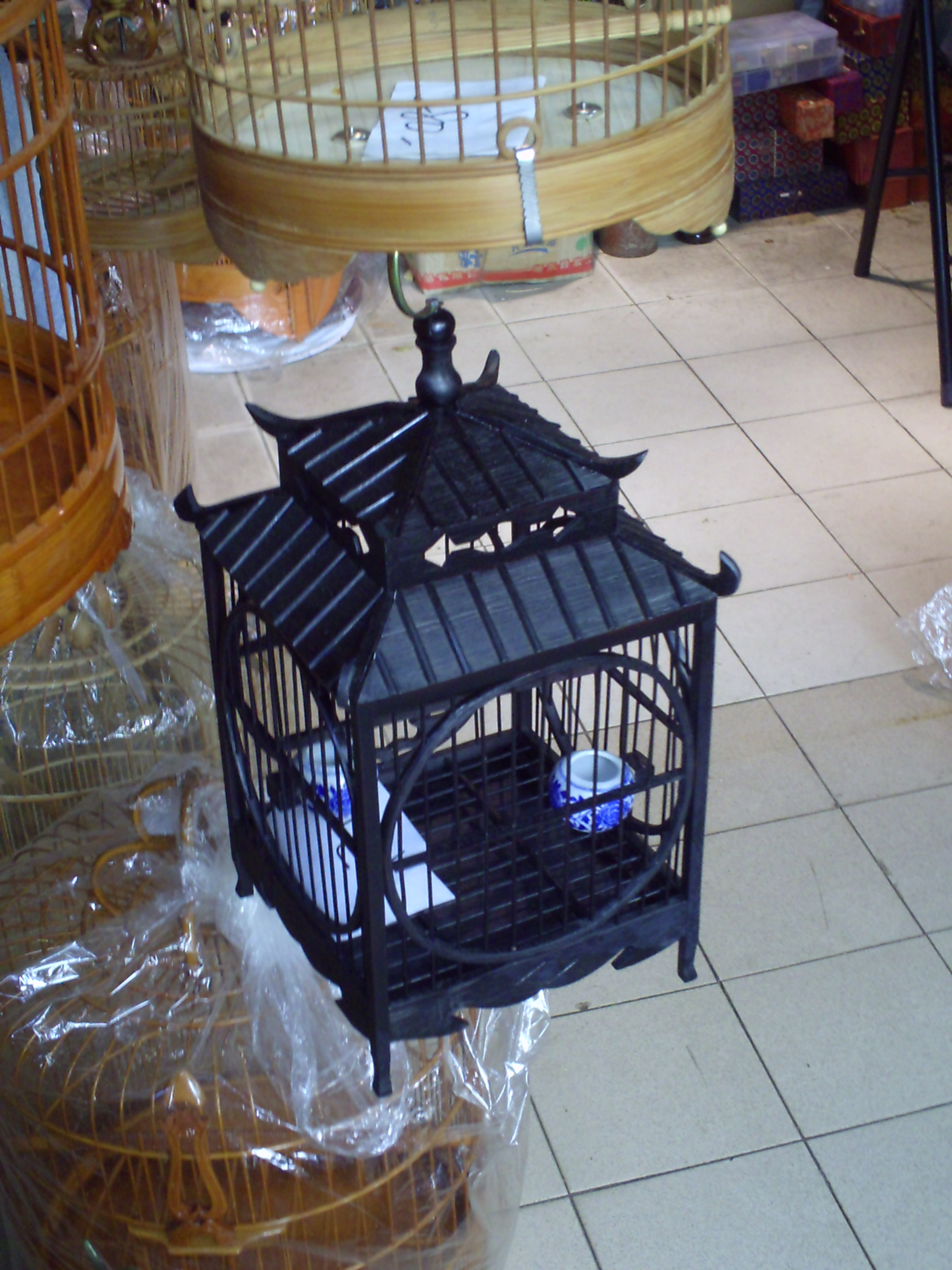 Bird cage with a rooftop in traditional Chinese rooftop