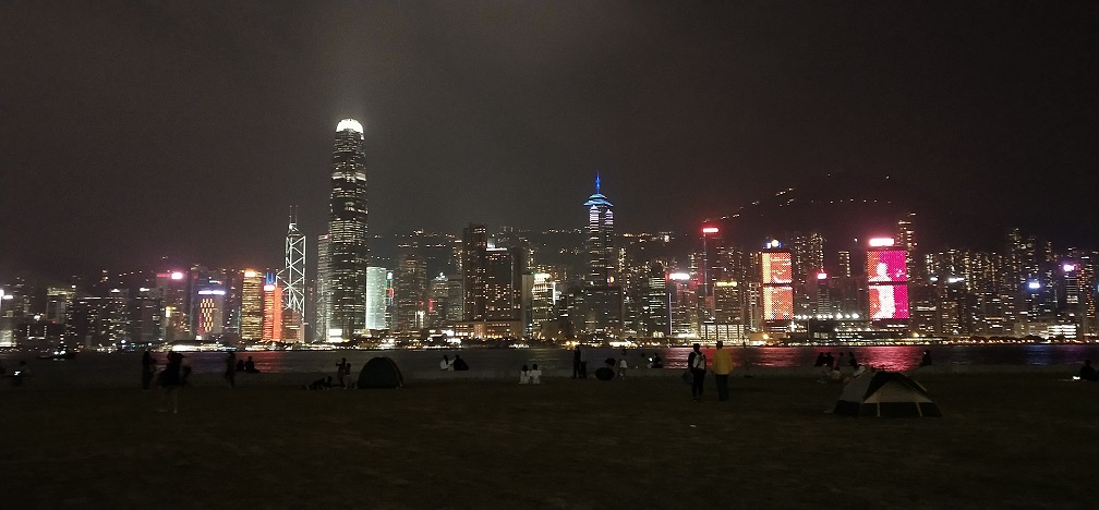 See Victoria Harbor view and Hong Kong skyline at West Kowloon Waterfront Promenade